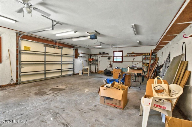 163 NW 9th St, Oak Island, NC 28465 - garage featuring a garage door opener and ceiling fan