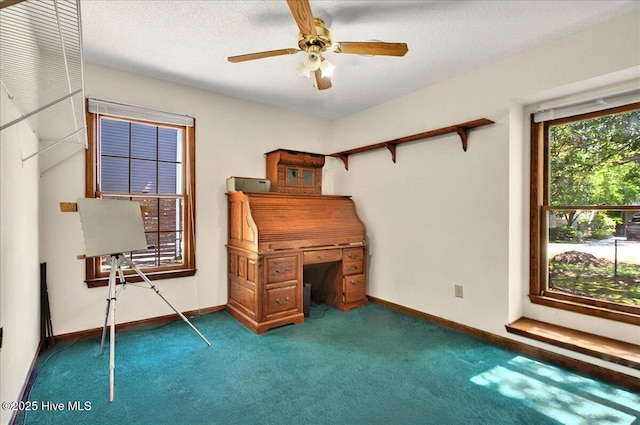 163 NW 9th St, Oak Island, NC 28465 - carpeted office space with a ceiling fan and baseboards