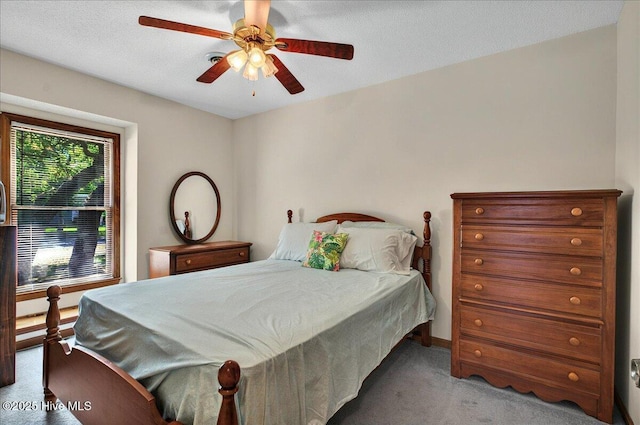 163 NW 9th St, Oak Island, NC 28465 - carpeted bedroom with a ceiling fan and baseboards