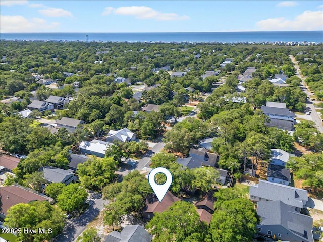163 NW 9th St, Oak Island, NC 28465 - aerial view of residential area with a large body of water