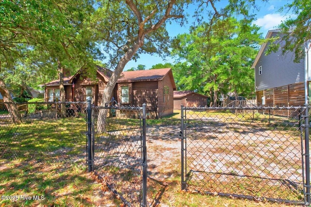 163 NW 9th St, Oak Island, NC 28465 - back of property with a gate