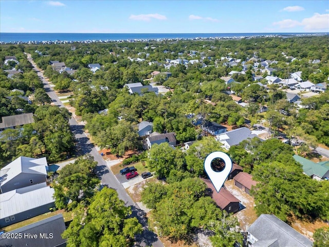 163 NW 9th St, Oak Island, NC 28465 - aerial perspective of suburban area featuring a large body of water