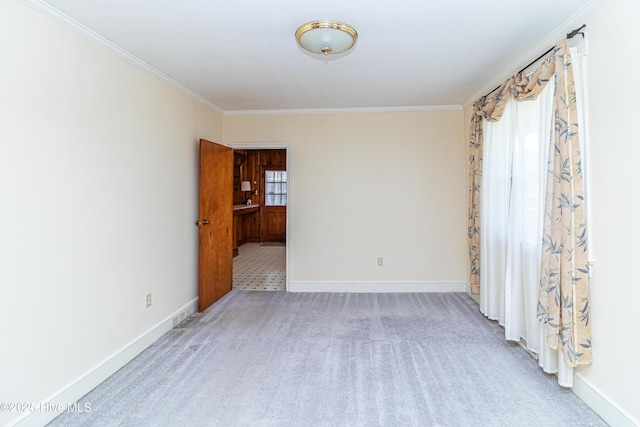 106 E New Hope Rd, Goldsboro, NC 27534 - carpeted empty room with crown molding and baseboards