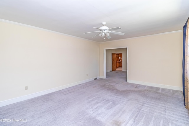 106 E New Hope Rd, Goldsboro, NC 27534 - spare room with ceiling fan, crown molding, and light colored carpet