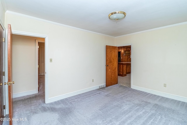 106 E New Hope Rd, Goldsboro, NC 27534 - empty room featuring carpet flooring and crown molding