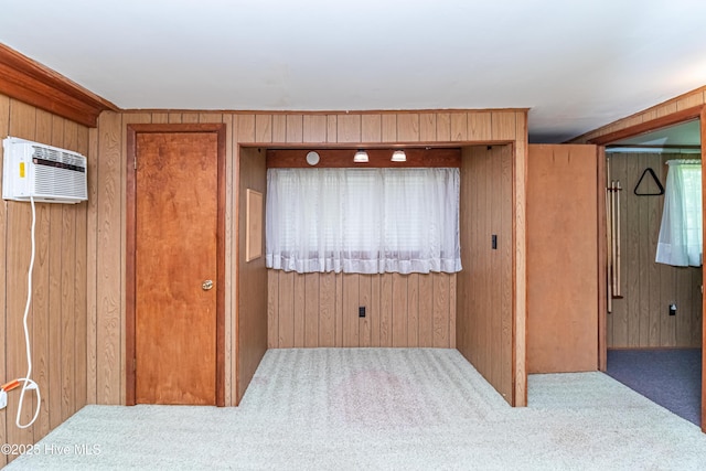 106 E New Hope Rd, Goldsboro, NC 27534 - carpeted spare room with wood walls and a wall unit AC