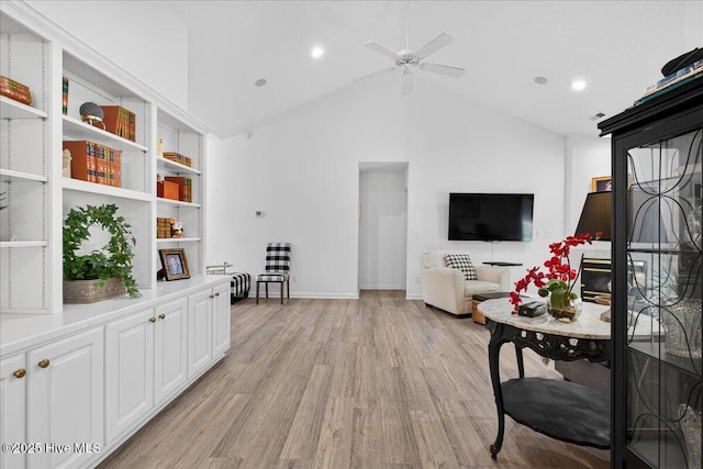 1610 Winding Way SW, Ocean Isle Beach, NC 28469 - living area featuring light wood-style floors, ceiling fan, recessed lighting, and high vaulted ceiling