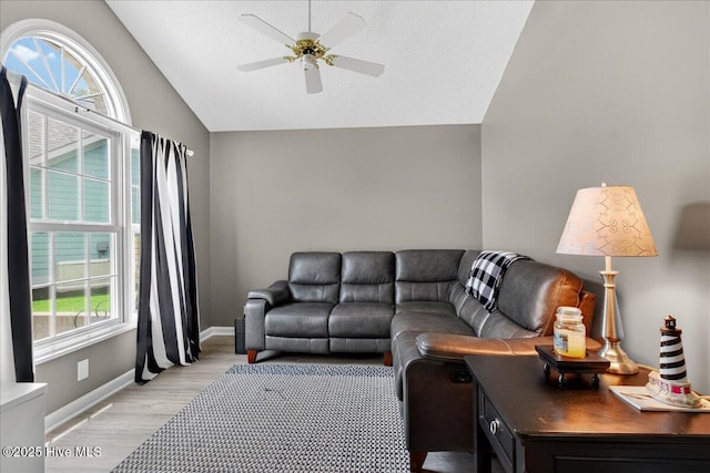 1610 Winding Way SW, Ocean Isle Beach, NC 28469 - living room with vaulted ceiling, light wood-style floors, and ceiling fan