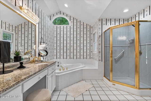 1610 Winding Way SW, Ocean Isle Beach, NC 28469 - bathroom featuring wallpapered walls, vaulted ceiling, a garden tub, vanity, and a shower stall
