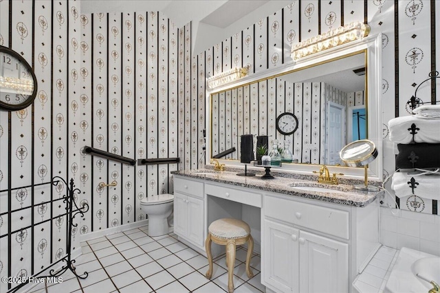 1610 Winding Way SW, Ocean Isle Beach, NC 28469 - bathroom featuring wallpapered walls, vanity, and tile patterned floors