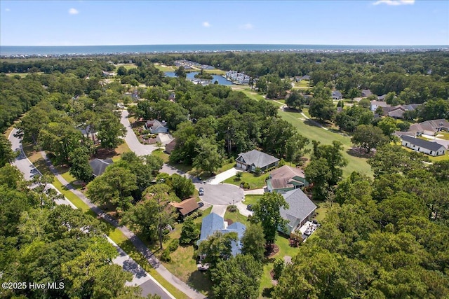 1610 Winding Way SW, Ocean Isle Beach, NC 28469 - aerial view of property and surrounding area with a large body of water and nearby suburban area