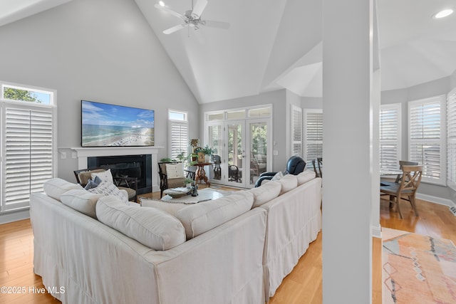 188 Edgewater Cir, Sunset Beach, NC 28468 - living room featuring high vaulted ceiling, healthy amount of natural light, light wood finished floors, recessed lighting, and ceiling fan