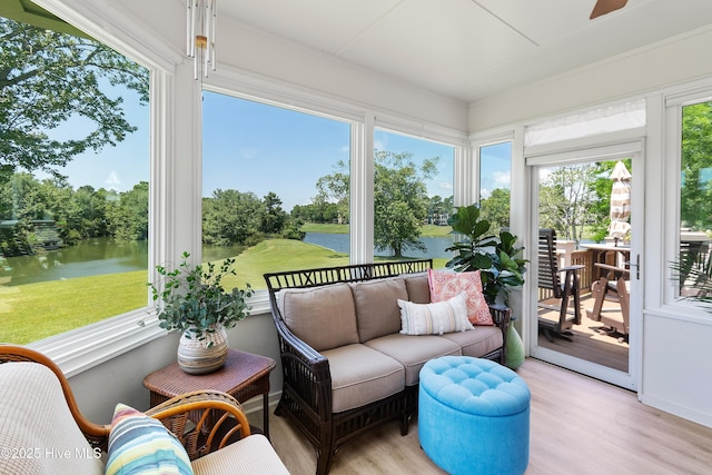 188 Edgewater Cir, Sunset Beach, NC 28468 - sunroom with a water view, wood finished floors, and outdoor lounge area