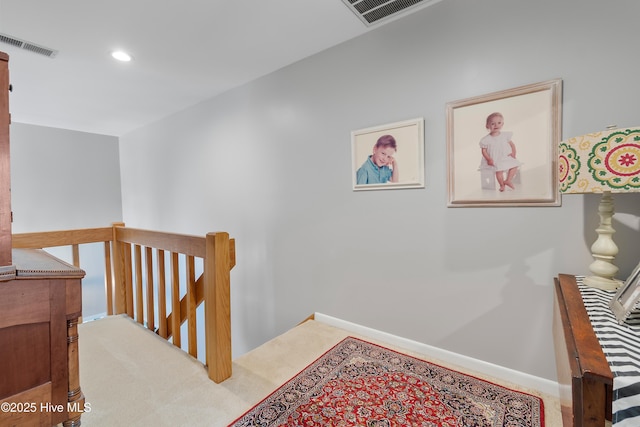 188 Edgewater Cir, Sunset Beach, NC 28468 - hallway featuring an upstairs landing, recessed lighting, and carpet flooring