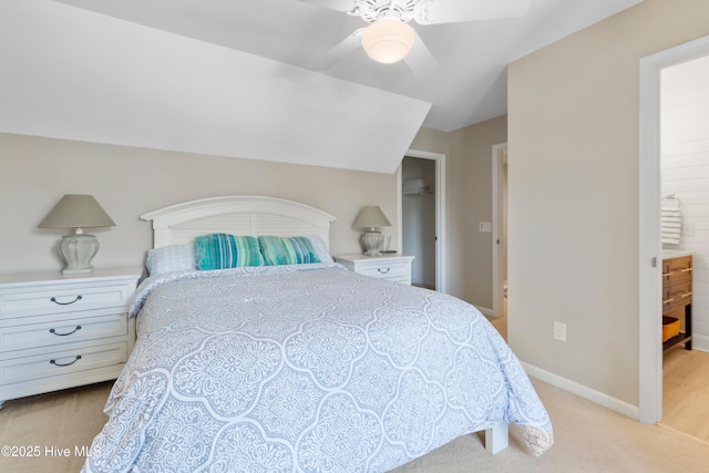 188 Edgewater Cir, Sunset Beach, NC 28468 - bedroom featuring light carpet, ceiling fan, and a spacious closet