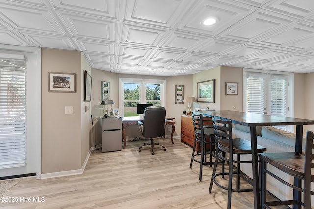 188 Edgewater Cir, Sunset Beach, NC 28468 - home office with an ornate ceiling and light wood-type flooring