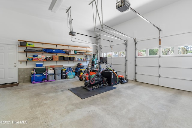 188 Edgewater Cir, Sunset Beach, NC 28468 - garage featuring a garage door opener