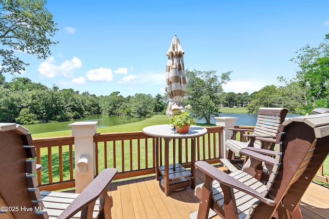 188 Edgewater Cir, Sunset Beach, NC 28468 - deck with a water view, a yard, view of scattered trees, and golf course view