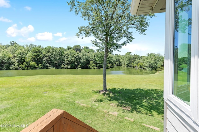 188 Edgewater Cir, Sunset Beach, NC 28468 - view of grassy yard featuring a water view and view of scattered trees