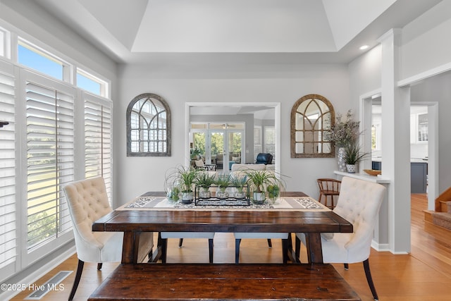 188 Edgewater Cir, Sunset Beach, NC 28468 - dining space with wood finished floors, vaulted ceiling, and recessed lighting