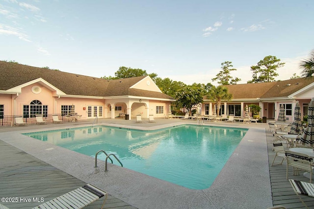 188 Edgewater Cir, Sunset Beach, NC 28468 - swimming pool with a patio area and french doors