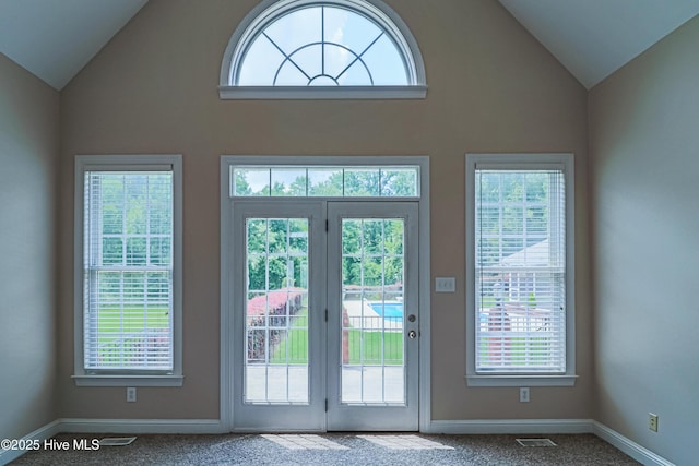 112 Highwoods Dr, Goldsboro, NC 27530 - doorway featuring carpet floors and high vaulted ceiling