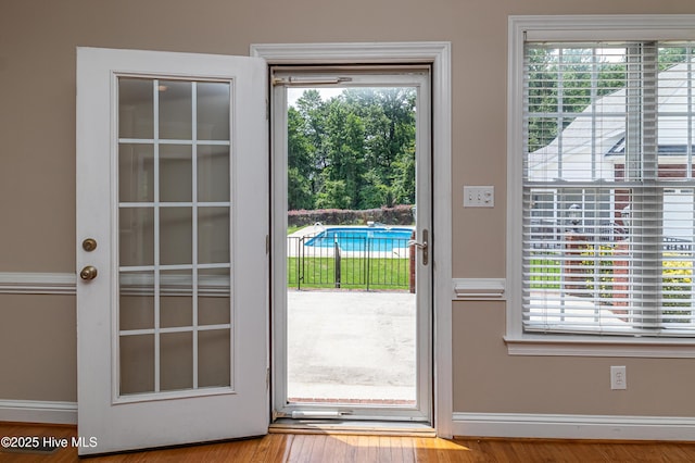 112 Highwoods Dr, Goldsboro, NC 27530 - doorway to outside featuring wood finished floors and baseboards
