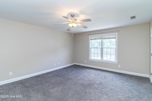112 Highwoods Dr, Goldsboro, NC 27530 - empty room with ceiling fan and dark carpet