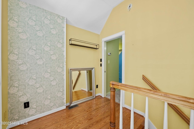 32 Windy Ct, Oriental, NC 28571 - hall with vaulted ceiling, light wood-type flooring, and an upstairs landing