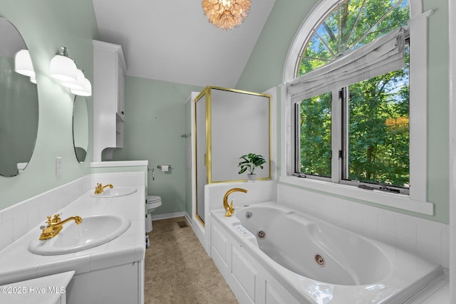 32 Windy Ct, Oriental, NC 28571 - full bath featuring a shower stall, a whirlpool tub, double vanity, and vaulted ceiling
