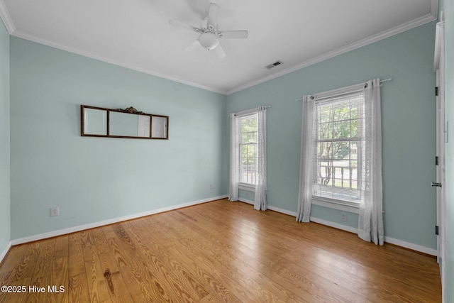 32 Windy Ct, Oriental, NC 28571 - unfurnished room featuring wood finished floors, ornamental molding, and ceiling fan