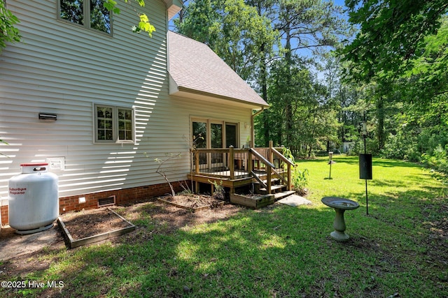 32 Windy Ct, Oriental, NC 28571 - view of side of property with a shingled roof, crawl space, a wooden deck, a lawn, and a garden