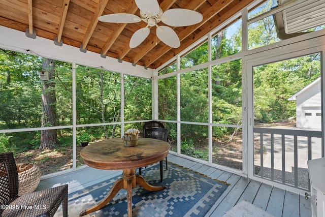 32 Windy Ct, Oriental, NC 28571 - sunroom featuring a ceiling fan and view of wooded area