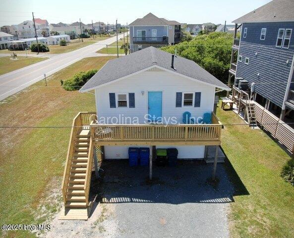 6703 13th Ave, North Topsail Beach, NC 28460 - rear view of property with stairway, driveway, a residential view, and a wooden deck