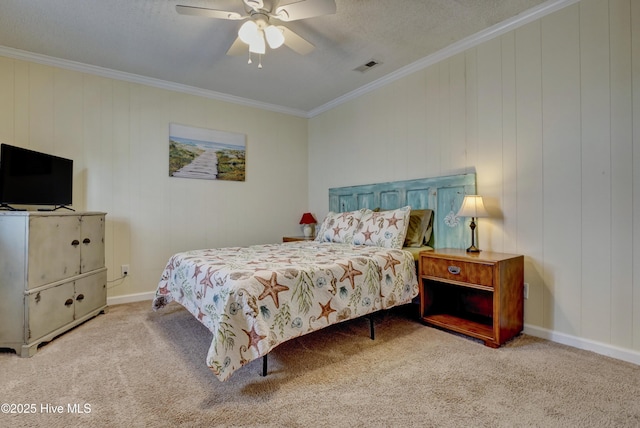 6703 13th Ave, North Topsail Beach, NC 28460 - bedroom featuring crown molding, carpet floors, and ceiling fan