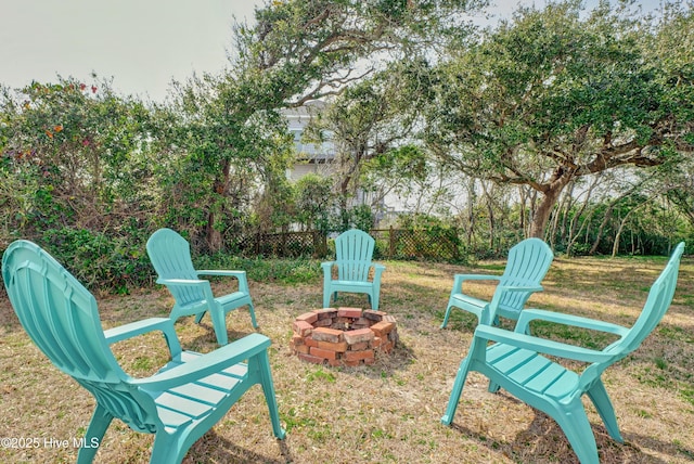 6703 13th Ave, North Topsail Beach, NC 28460 - view of yard featuring an outdoor fire pit
