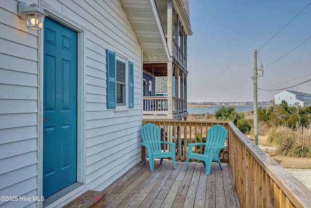 6703 13th Ave, North Topsail Beach, NC 28460 - wooden deck with a water view