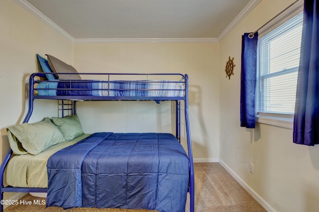 6703 13th Ave, North Topsail Beach, NC 28460 - carpeted bedroom featuring ornamental molding and baseboards