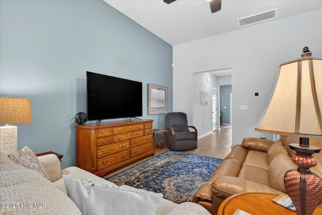 1673 White Starfish Ct, Calabash, NC 28467 - living area featuring wood finished floors, ceiling fan, and high vaulted ceiling