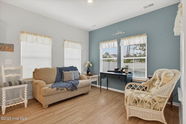 1673 White Starfish Ct, Calabash, NC 28467 - sitting room with light wood-style flooring