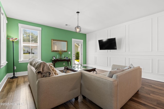 9154 Village Lake Dr SW, Calabash, NC 28467 - living area featuring dark wood-style flooring