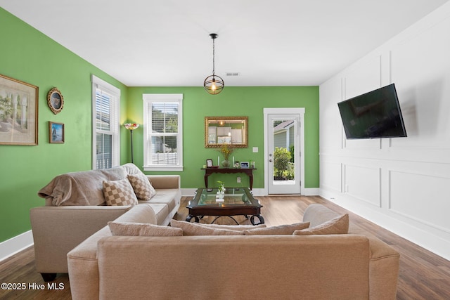 9154 Village Lake Dr SW, Calabash, NC 28467 - living area featuring dark wood-style floors