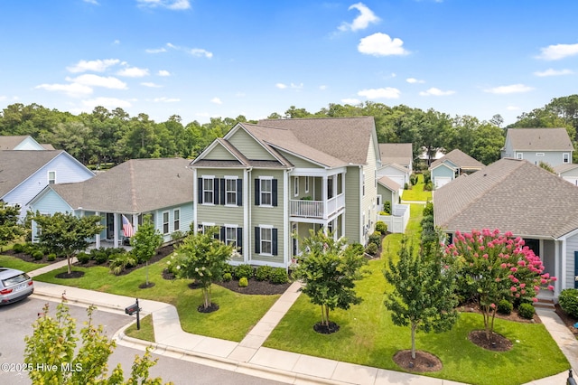 9154 Village Lake Dr SW, Calabash, NC 28467 - view of front facade with a residential view and a front yard