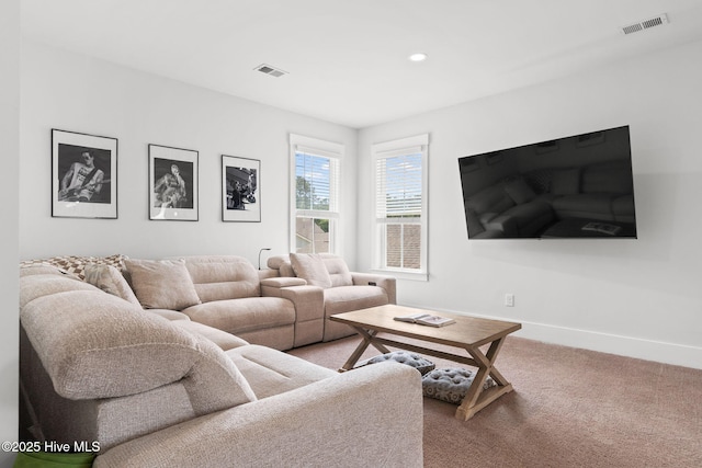 9154 Village Lake Dr SW, Calabash, NC 28467 - living room featuring light colored carpet and recessed lighting