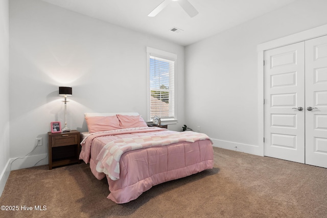 9154 Village Lake Dr SW, Calabash, NC 28467 - carpeted bedroom featuring a closet and a ceiling fan