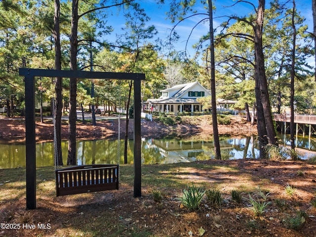 9154 Village Lake Dr SW, Calabash, NC 28467 - dock featuring a water view