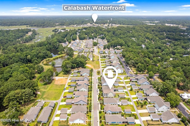 9154 Village Lake Dr SW, Calabash, NC 28467 - aerial perspective of suburban area