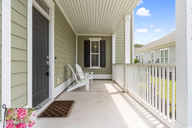 9154 Village Lake Dr SW, Calabash, NC 28467 - view of covered porch