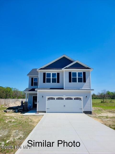 465 Fowler Manning Rd, Richlands, NC 28574 - view of front of home featuring a garage and driveway