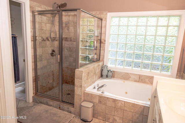 4725 Wedgefield Dr, Wilmington, NC 28409 - full bathroom with a stall shower, a whirlpool tub, and vanity
